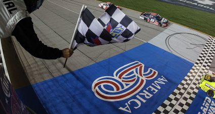 Brandon Jones, driver of the #20 Menards/MD Building Products Toyota, takes the checkered flag to win the NASCAR O'Reilly Auto Parts Series Cuervo 300 at Chicagoland Speedway on July 04, 2026 in Joliet, Illinois. (Photo by James Gilbert/Getty Images)