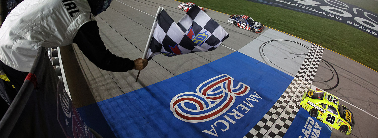 Brandon Jones, driver of the #20 Menards/MD Building Products Toyota, takes the checkered flag to win the NASCAR O'Reilly Auto Parts Series Cuervo 300 at Chicagoland Speedway on July 04, 2026 in Joliet, Illinois. (Photo by James Gilbert/Getty Images)